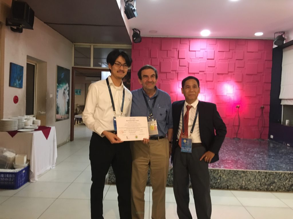 Activity 9: a Ph.D. student from Japan receives a Best Student Paper Award certificate of AICI 2020 from Scientific Committee chairs.